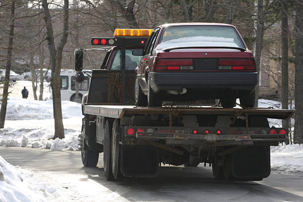 Do you need insurance to tow a car